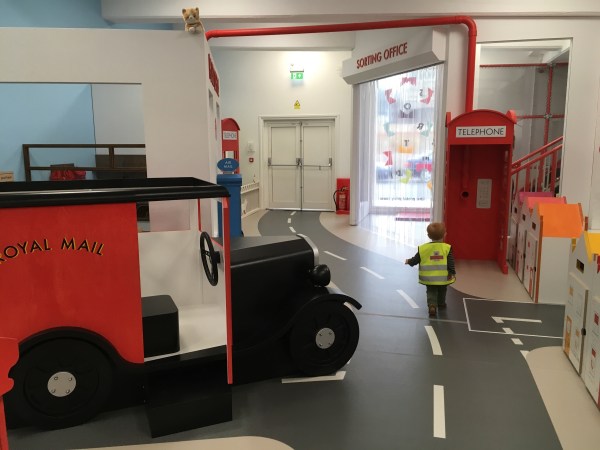 Child exploring Sorted, the play area at The Postal Museum in London